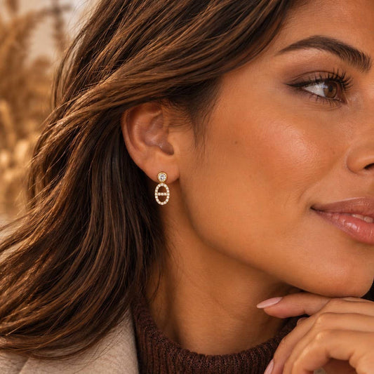 Boucles oreilles Prestige dorées ovale serti