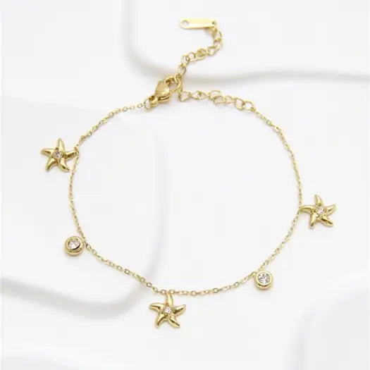 Bracelet Marin Acier Doré Avec Étoiles De Mer Et Cristaux