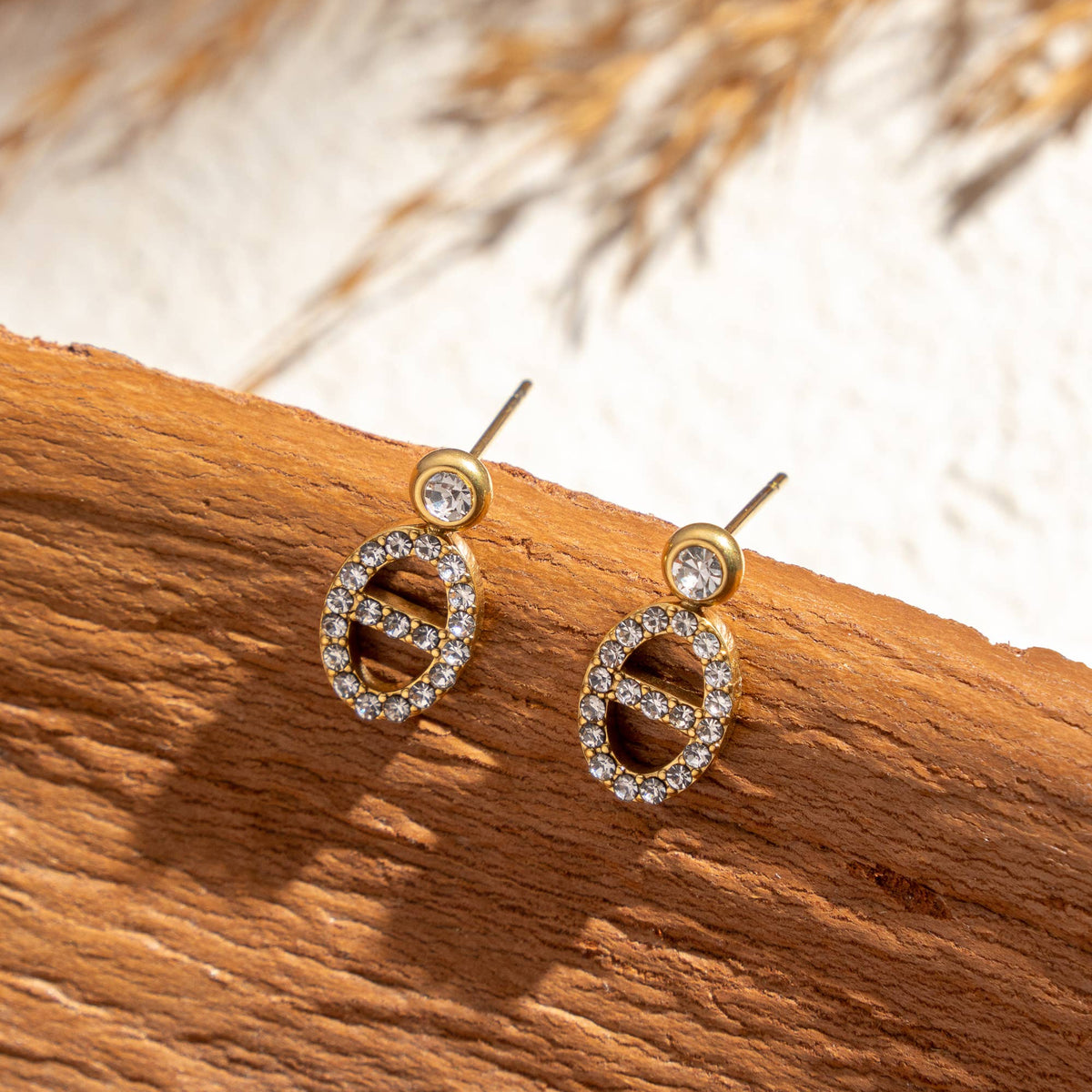 Boucles oreilles Prestige dorées ovale serti