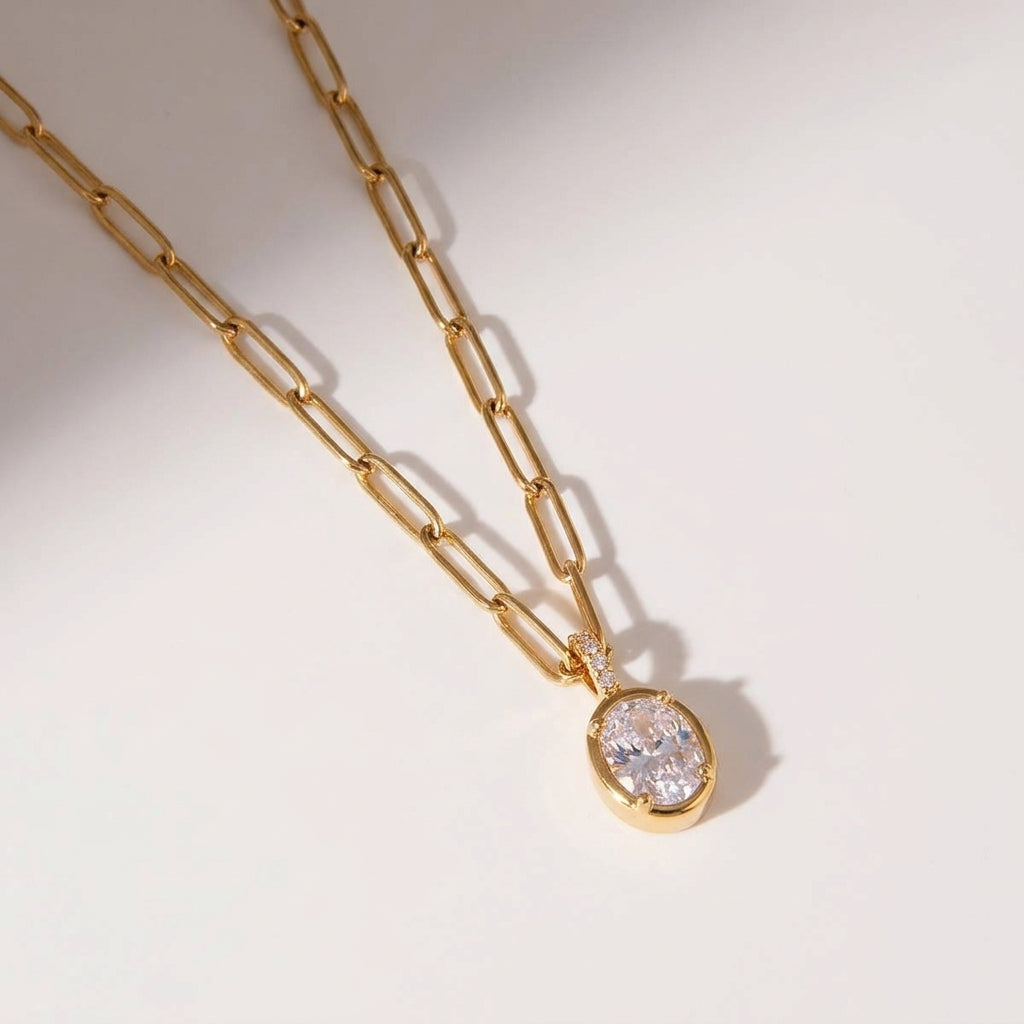 Collier ETERNEL en acier doré et zircon blanc