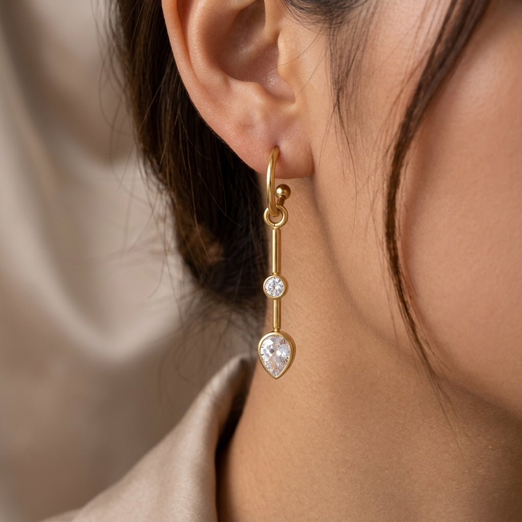 Boucles d'oreilles ECLAT en acier doré et zircon blanc