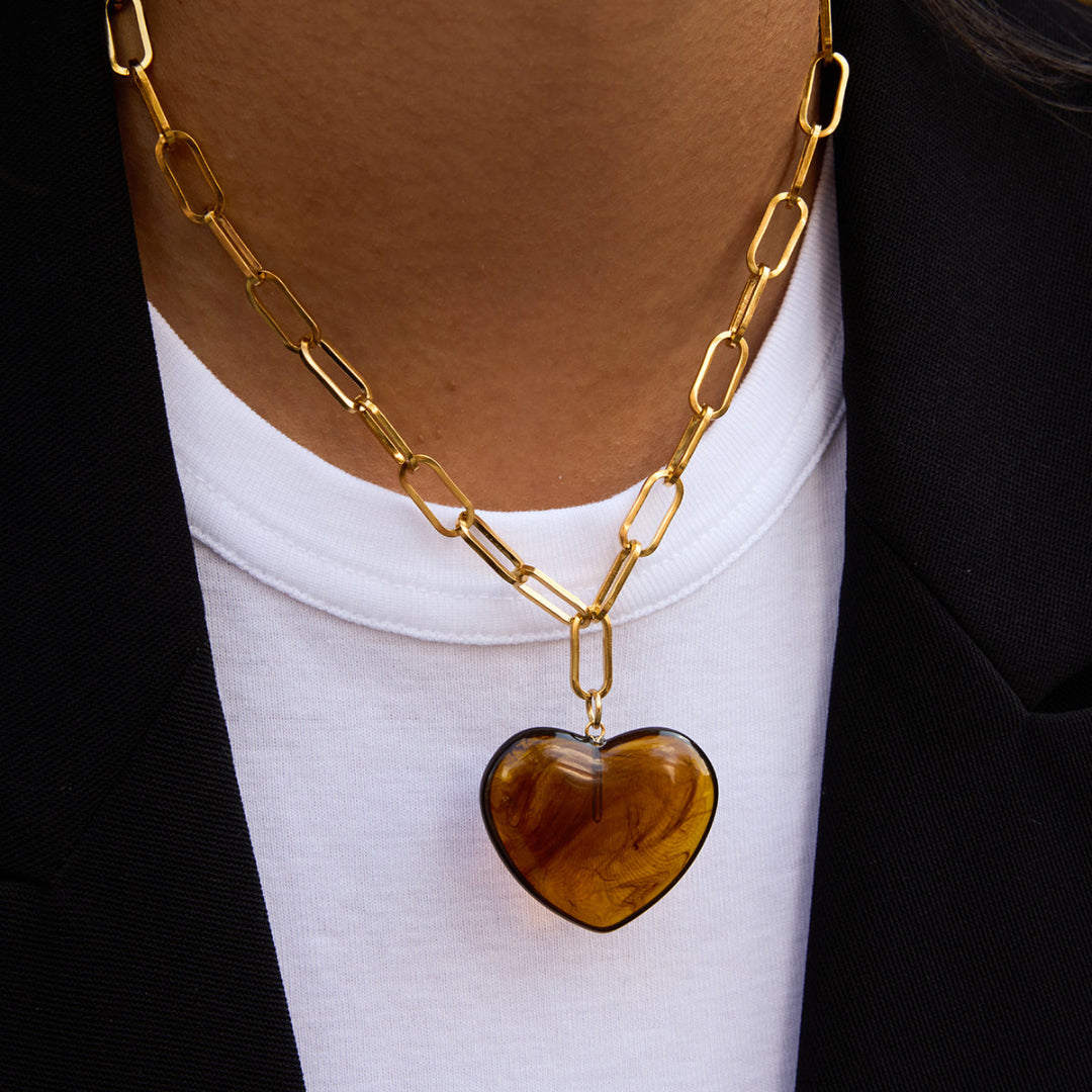 Collier cœur TOURNOYANT en acier doré