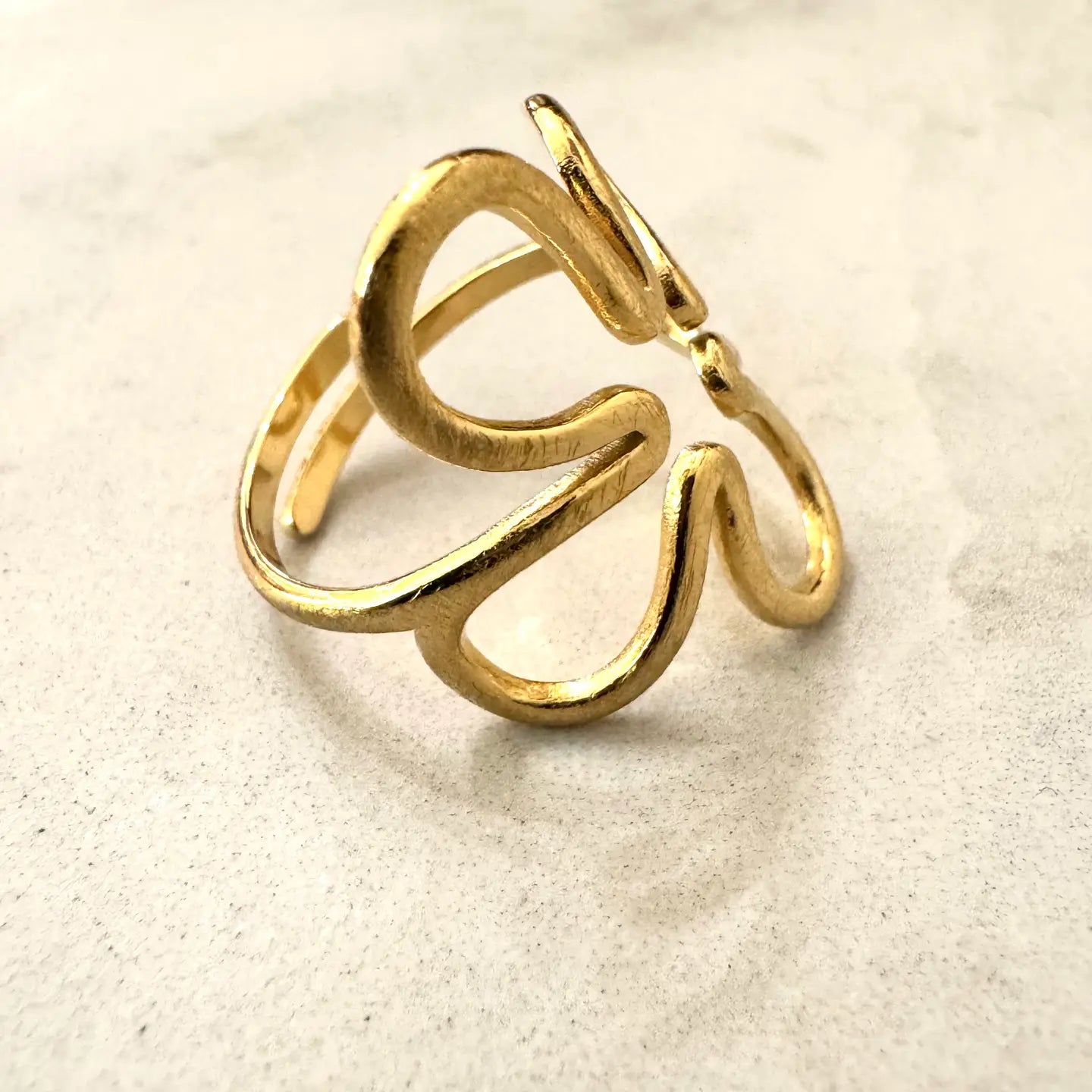 BagueMargueritte en acier doré brossé