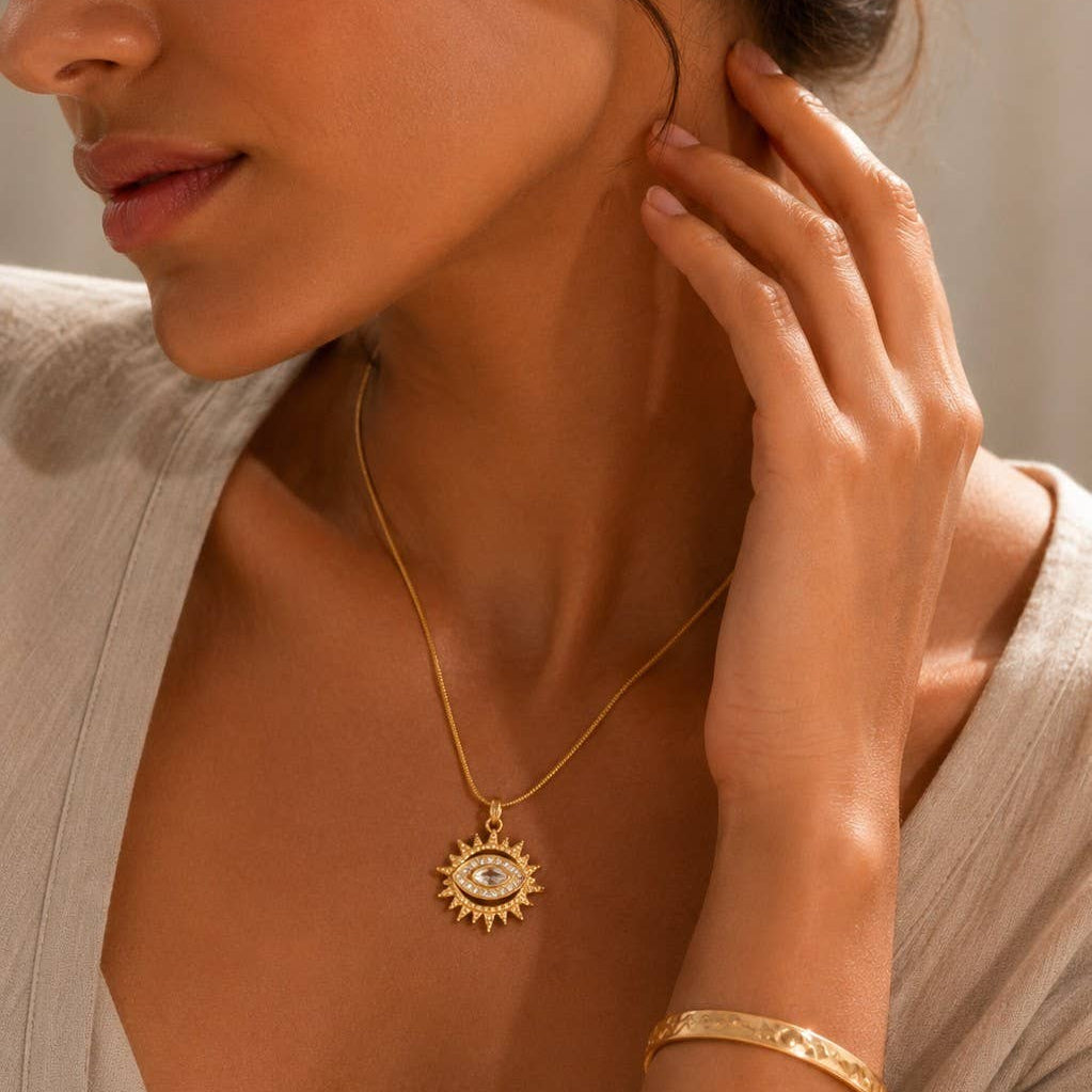 Collier soleil oeil cristal doré