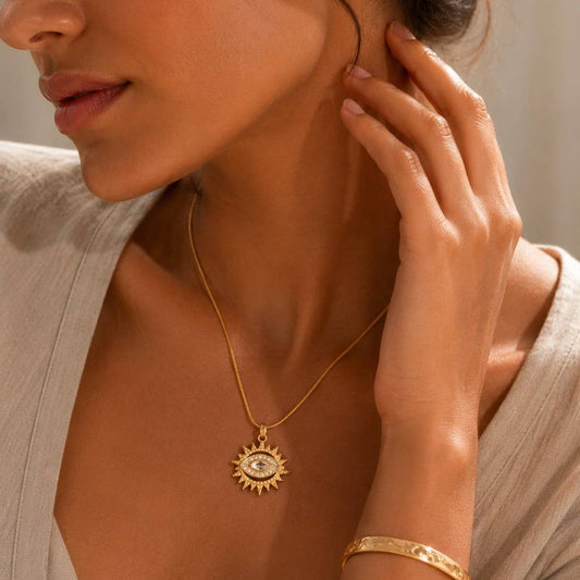 Collier soleil oeil cristal doré