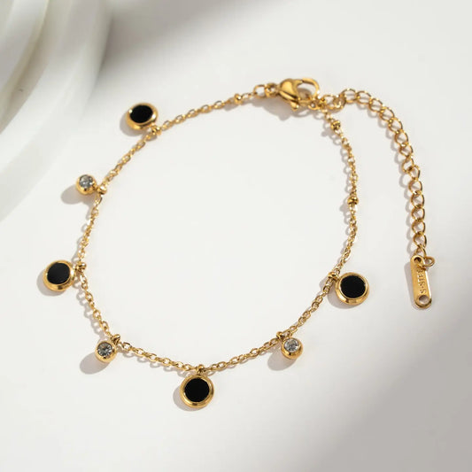 Bracelet pampilles noires et dorées en acier inoxydable